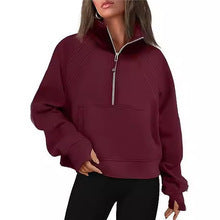 Damen nan weit geschnittenes Kurzpullover mit Stehkragen, halbem Reißverschluss und Kängurutasche Shop Nory