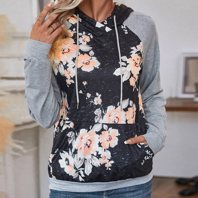 Damen Lässiger Kapuzenpullover mit floralem Print, Raglanärmeln und Kängurutasche Shop Nory