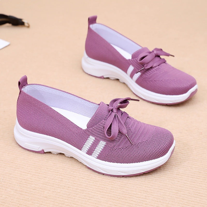 Damen Schlupf-Strick-Sneaker mit dekorativer Schleife und gedämpfter Plateausohle Shop Nory