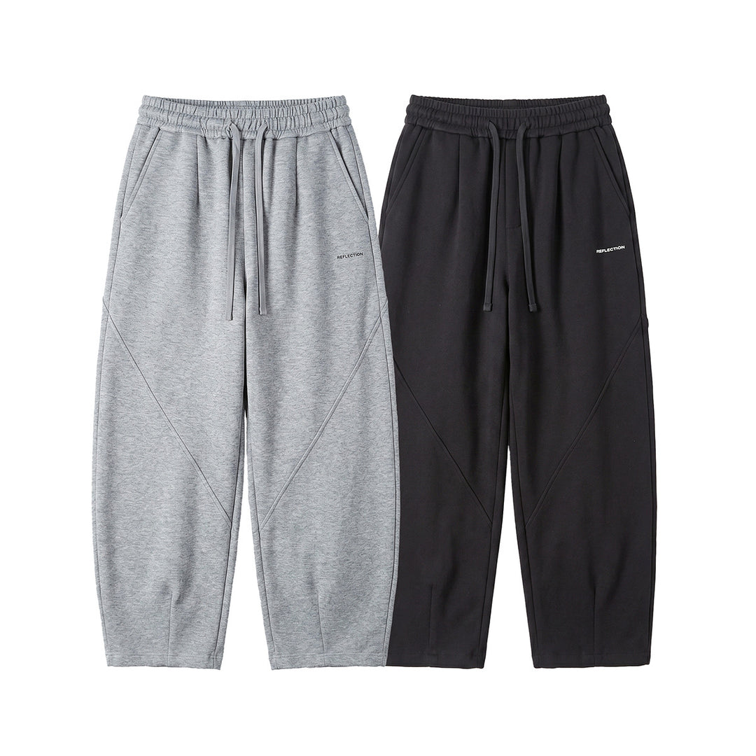 Herren Locker geschnittene Jogginghose mit Tunnelzug, Zierrnähten und Eingrifftaschen Shop Nory