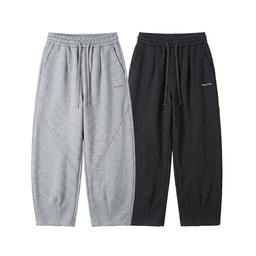 Herren Locker geschnittene Jogginghose mit Tunnelzug, Zierrnähten und Eingrifftaschen Shop Nory