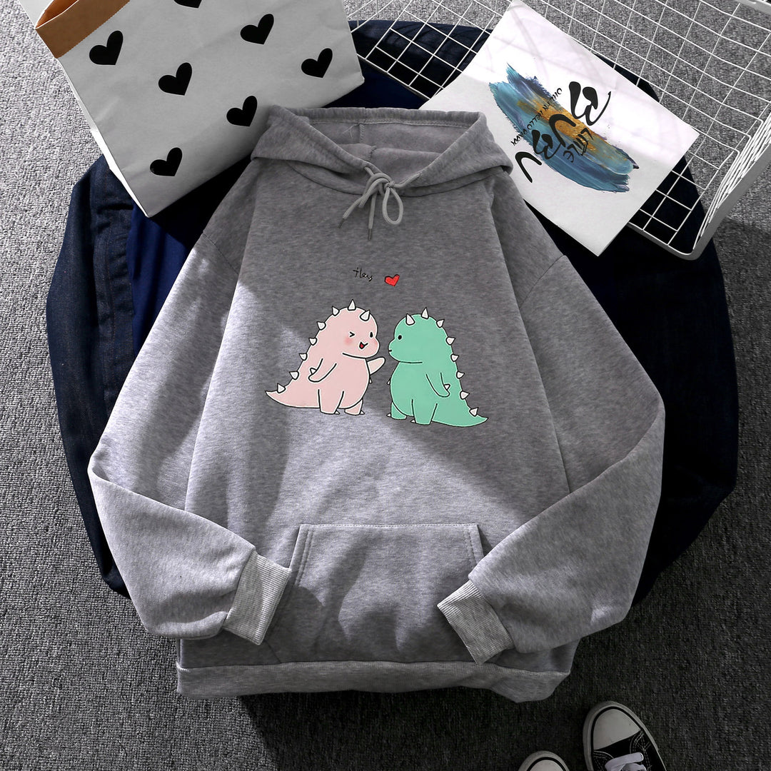 Damen nan Kapuzenpullover mit niedlicher Dinosaurierpärchen‑Illustration, Oversize‑Schnitt und Kängurutasche Shop Nory