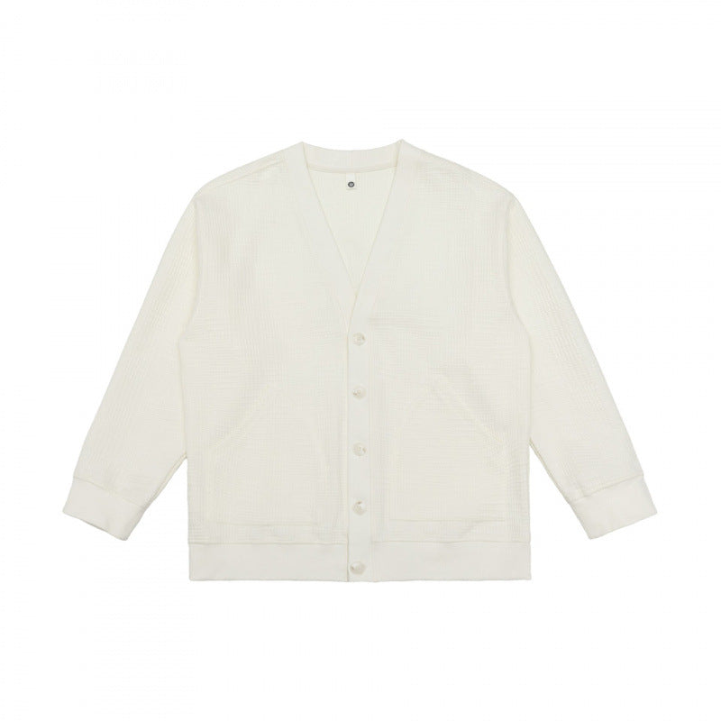 Unisex Oversize Waffelstrick-Cardigan mit V-Ausschnitt, Knopfleiste und aufgesetzten Taschen Shop Nory