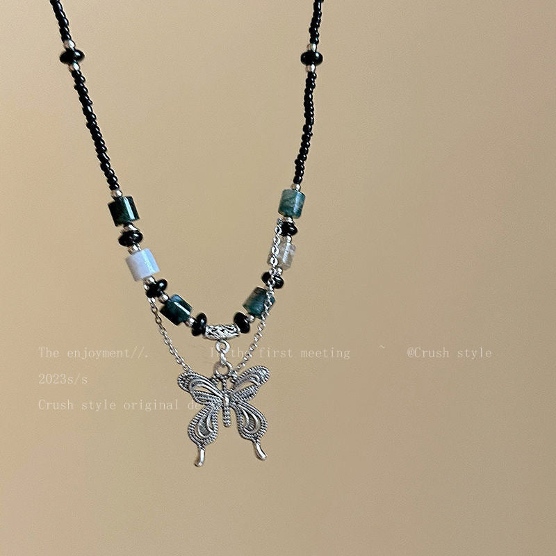 Damen Halskette mit kunstvollem Schmetterlingsanhänger und natürlichen Edelsteinen Shop Nory
