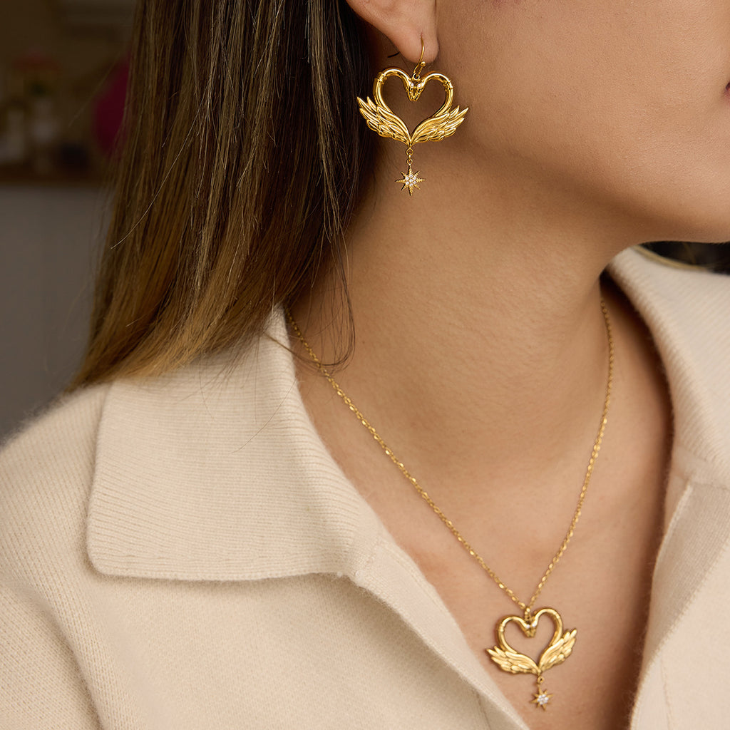 Damen Ohrhänger im eleganten Herzdesign mit schimmernden Zirkonia und hypoallergenem Edelstahl Shop Nory