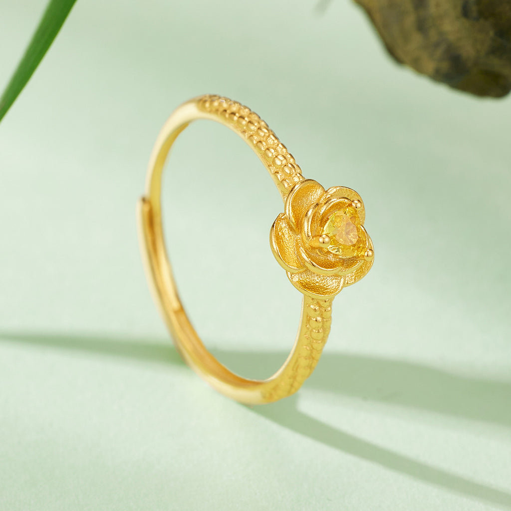Damen Ring mit blütenförmigem Schmuckdesign und funkelndem gelbem Edelstein Shop Nory