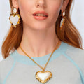 Damen Schmuckset mit herzförmigen Anhängern und eleganten Goldakzenten Shop Nory