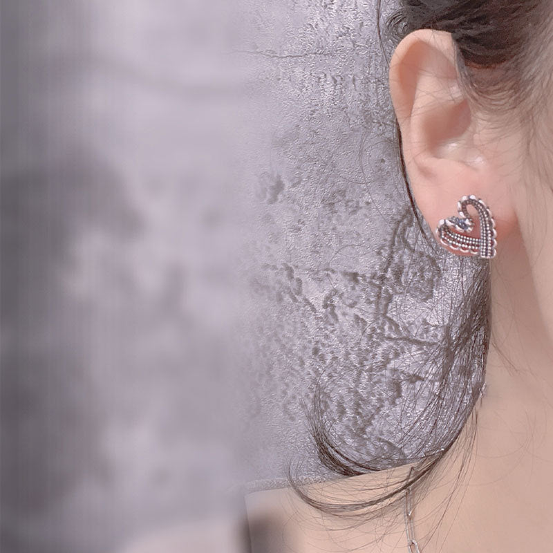 Damen Ohrringe mit filigranem Herzdesign Shop Nory