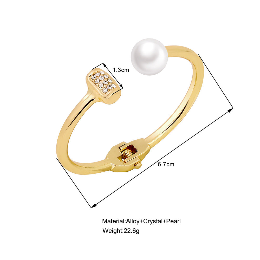 Damen Armreif mit eleganten Perlen und strukturiertem Design Shop Nory