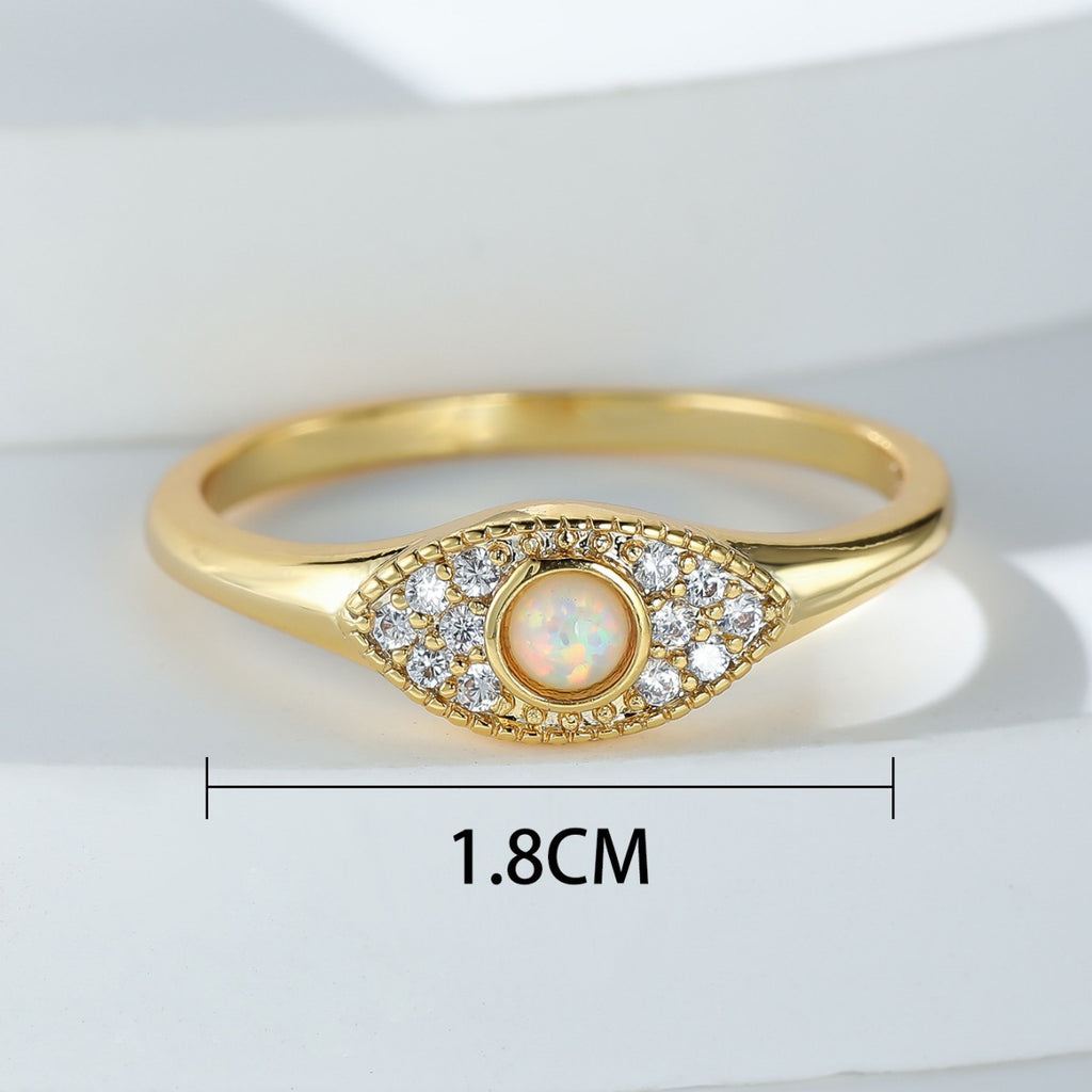 Damen Ring mit funkelndem Opal-Motiv und kunstvollen Zirkonia-Verzierungen Shop Nory