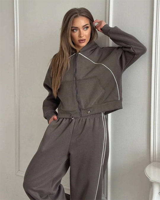 Damen kurzes Kapuzen-Sweatset mit Frontreißverschluss, kontrastierender Paspel und elastischer Highwaist-Jogger Shop Nory