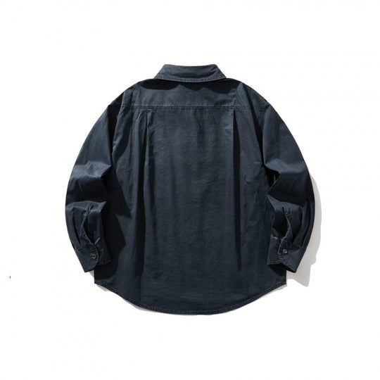 Unisex Oversize-Denim-Hemdjacke mit kastiger Silhouette, Brusttasche und gerundetem Saum Shop Nory