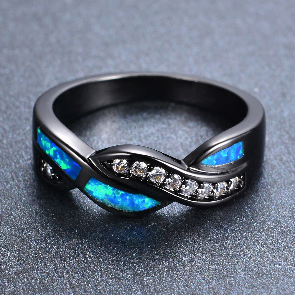 Damen Ring mit geschwungenem Design und funkelnden Zirkonia Shop Nory