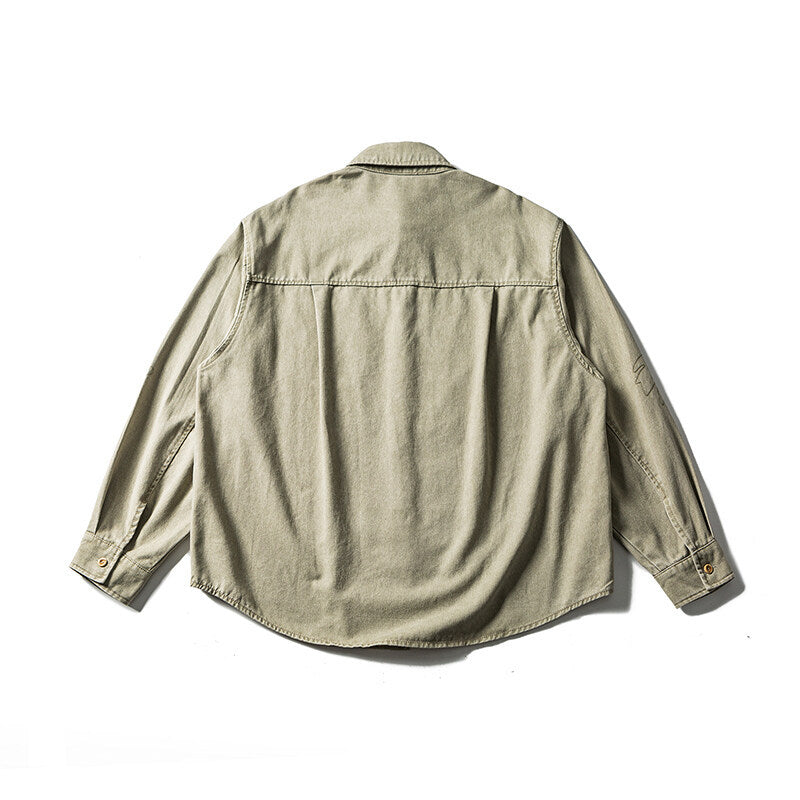 Unisex Oversize Hemdjacke mit gestickten Blattmotiven und abgerundetem Saum Shop Nory