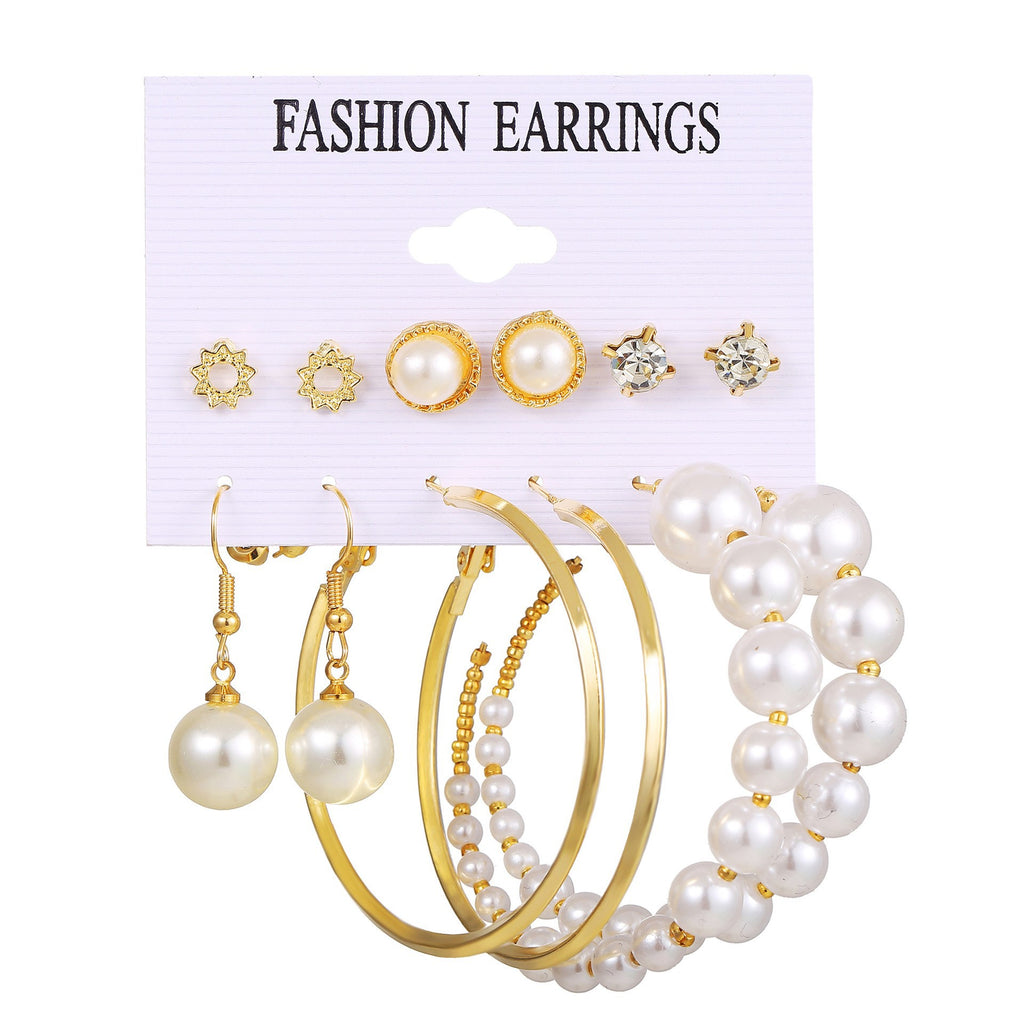 Damen Ohrringe Set mit eleganten herzförmigen Anhängern und funkelnden Kristallen Shop Nory
