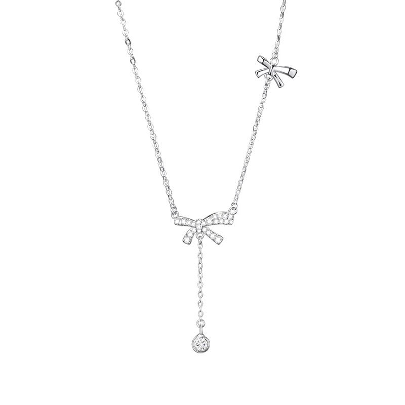 Damen Halskette mit funkelndem Schleifen- und Schmetterlingsdesign Shop Nory