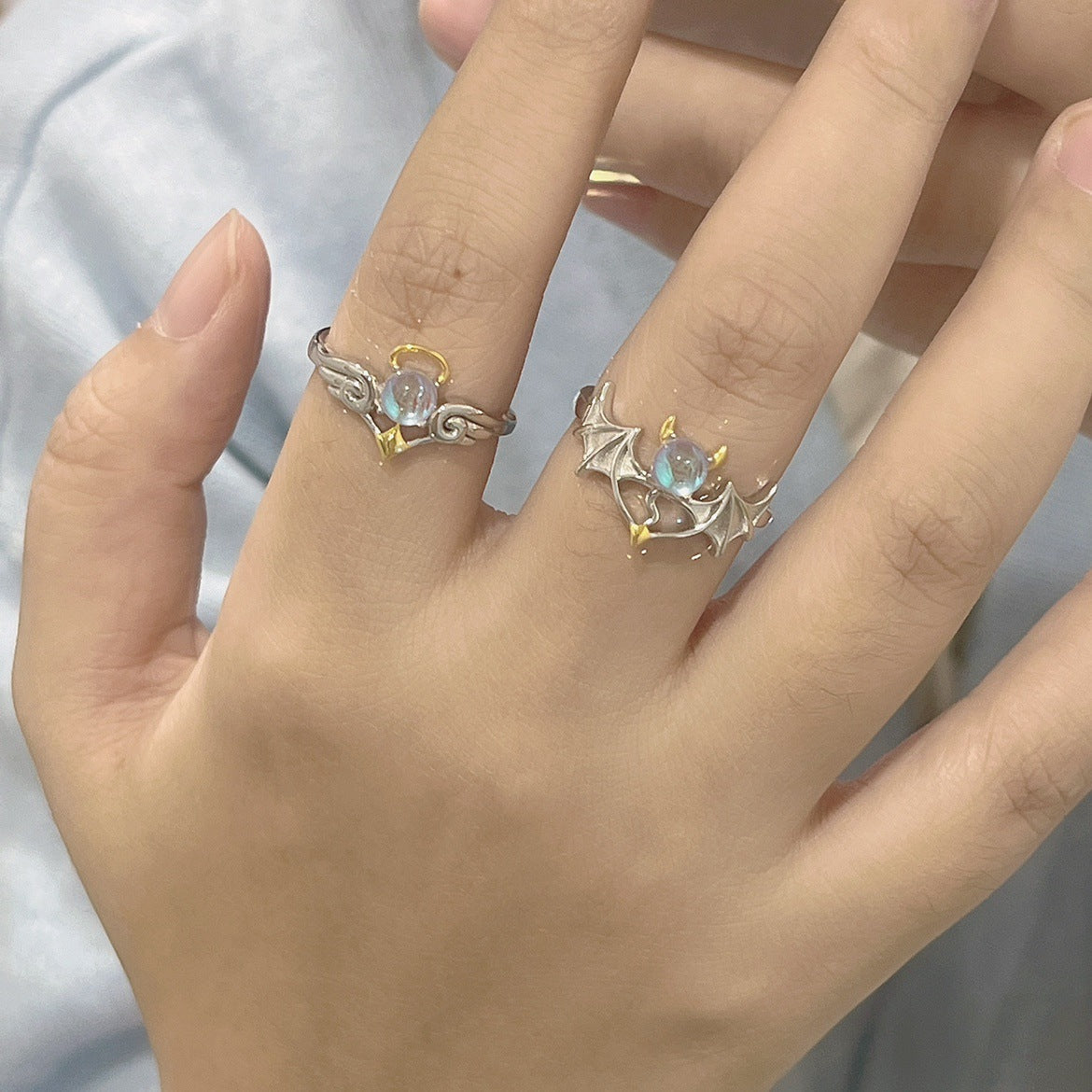Damen kunstvoller Ring mit funkelndem Opal und eleganten Details Shop Nory