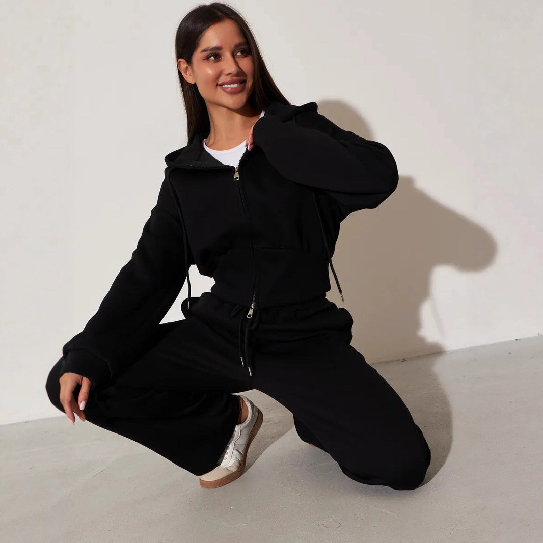 Damen kurzes Kapuzen-Zipshirt mit tailliertem Tunnelzug und weit geschnittene High-Waist-Loungehose Shop Nory