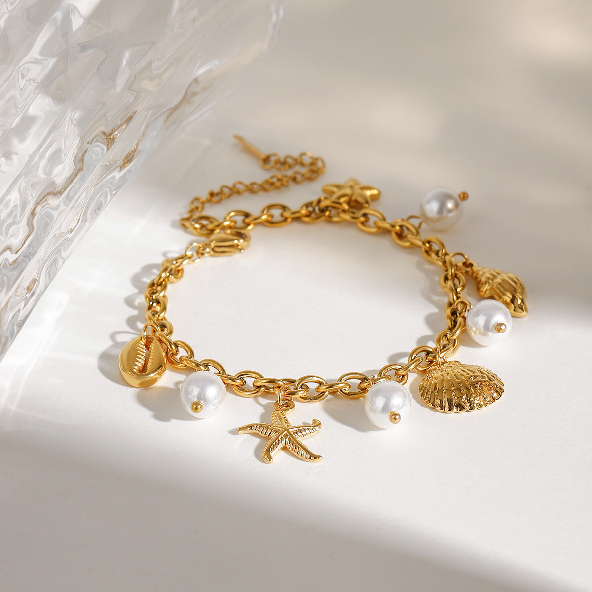 Damen Fußkettchen mit maritimen Muschelmotiven und hypoallergener Edelstahlverarbeitung Shop Nory