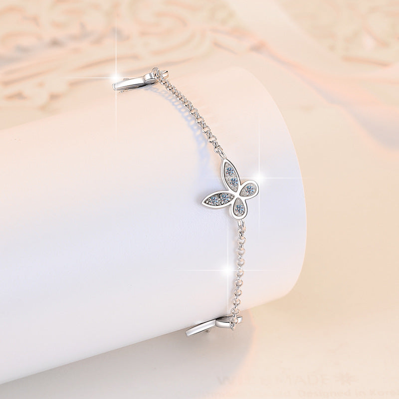 Damenarmband mit verspieltem Schmetterlingsdesign und funkelnden Zirkonia Shop Nory