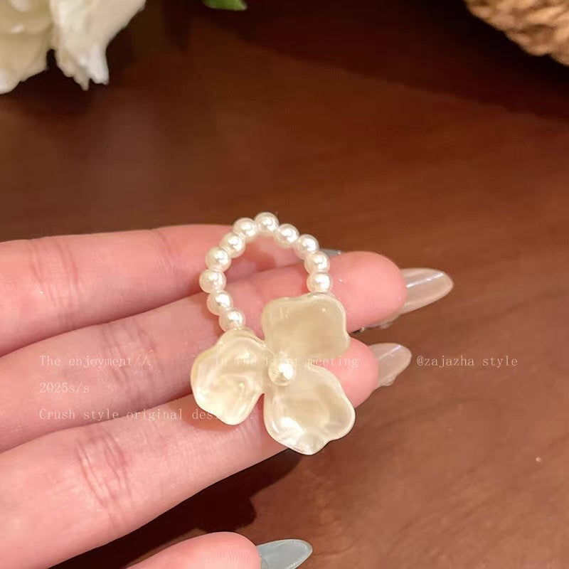 Damen Haarreif mit eleganter Blumenapplikation und Zierperlen Shop Nory