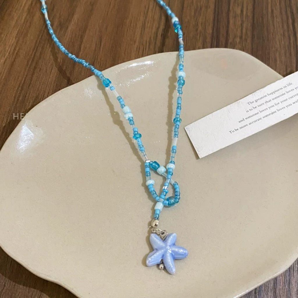 Damen Kette mit handgefertigtem Blumenanhänger Shop Nory