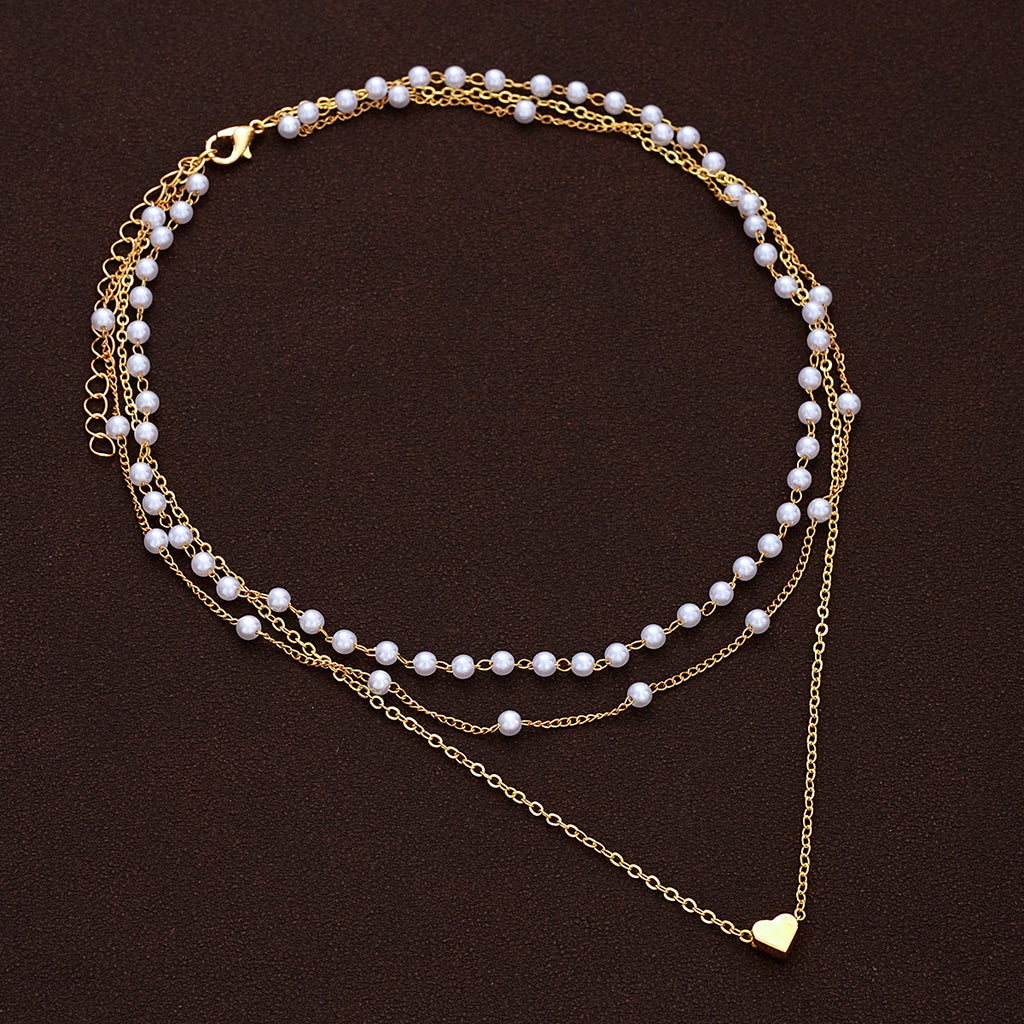 Damen mehrlagige Halskette mit Perlenschmuck und Herzanhänger Shop Nory