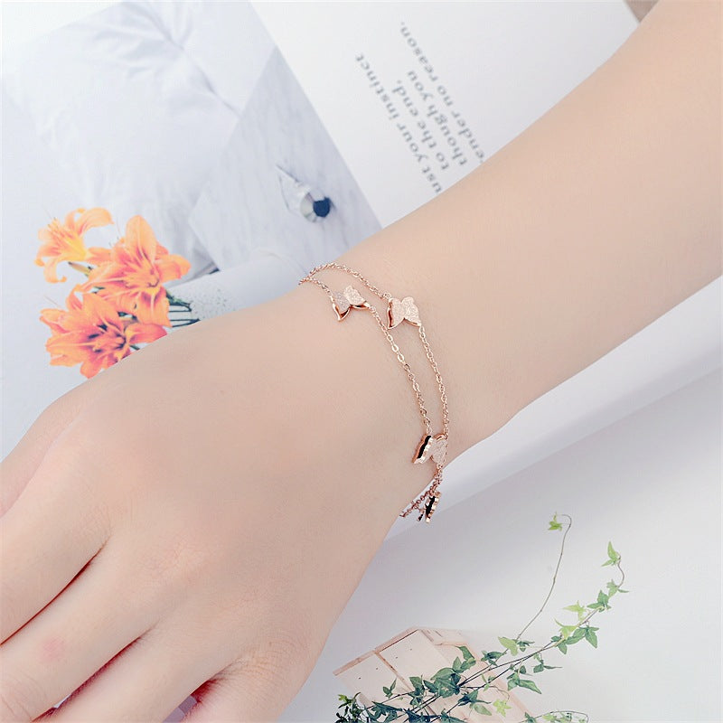Damen Armreif mit funkelndem Schmetterlingsdesign Shop Nory
