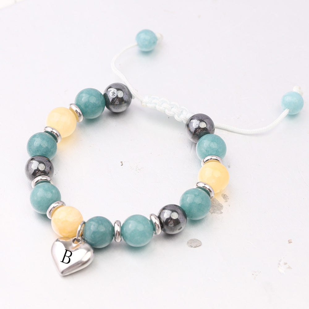 Damen Armband mit personalisiertem Herzanhänger und bunten Halbedelsteinen Shop Nory