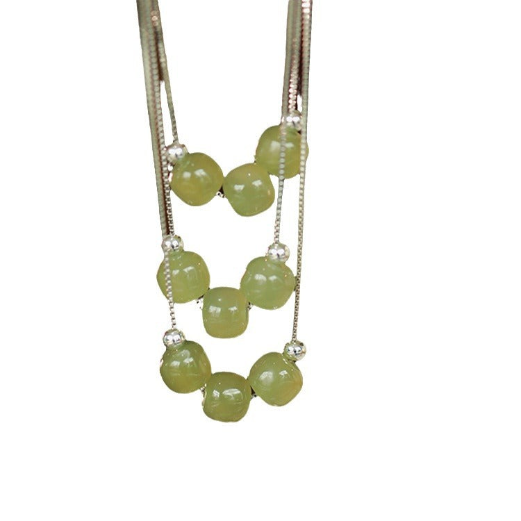 Damen Halskette mit hochwertigem Jade-Anhänger und Edelstahl-Elementen Shop Nory