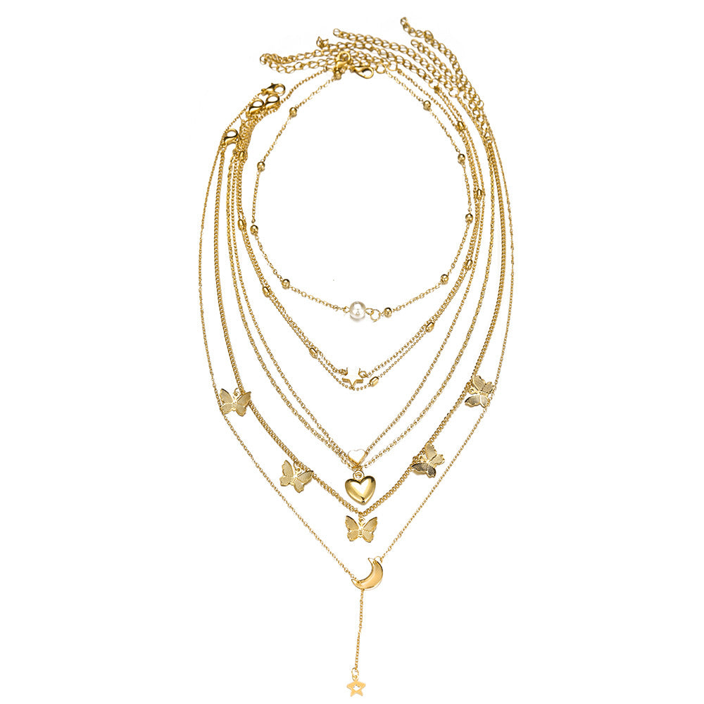 Damen Schmuckset mit mehrlagigen Ketten und vielfältigen Ringen Shop Nory