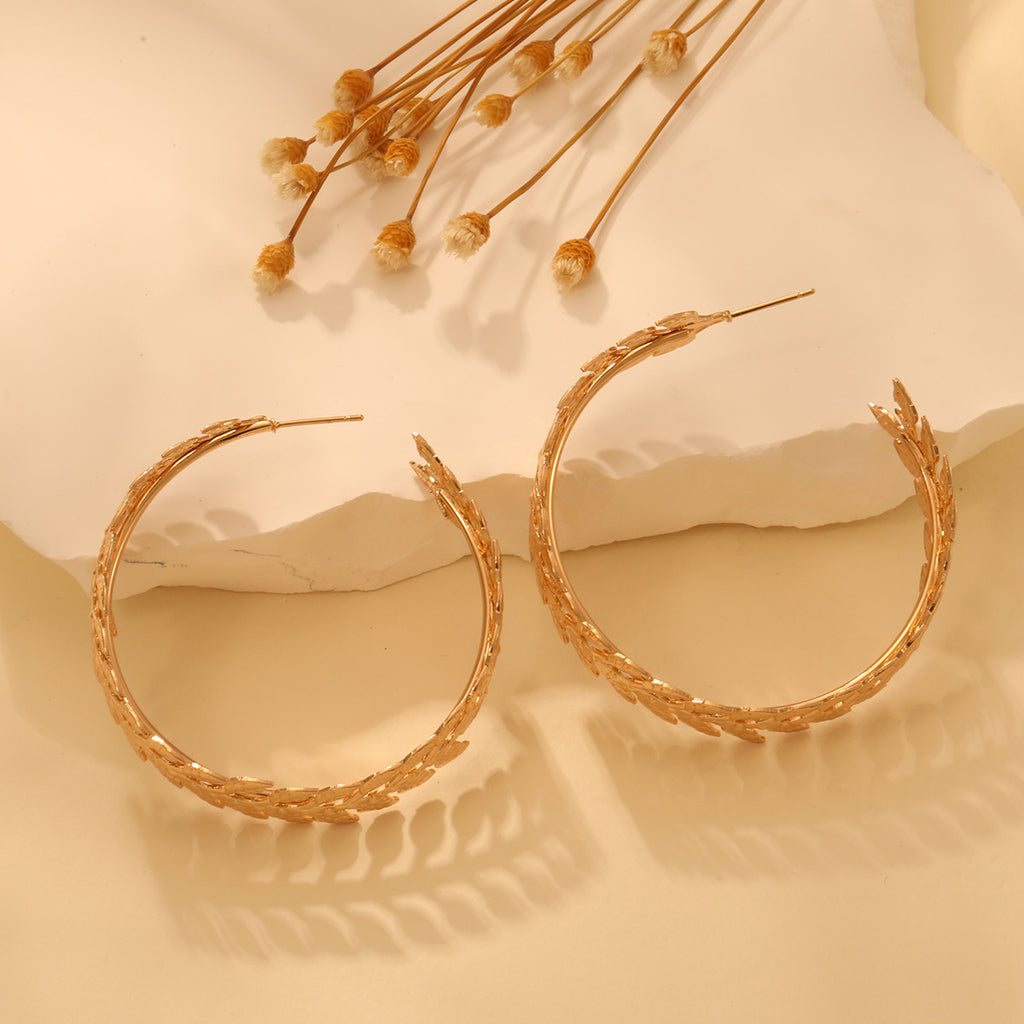Damen Ohrringe im einzigartigen, geschwungenen Design Shop Nory