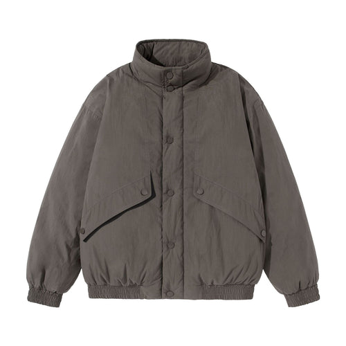Unisex Kurz geschnittene gesteppte Boxy‑Blousonjacke mit hohem Stehkragen und Utility‑Flaptaschen Shop Nory