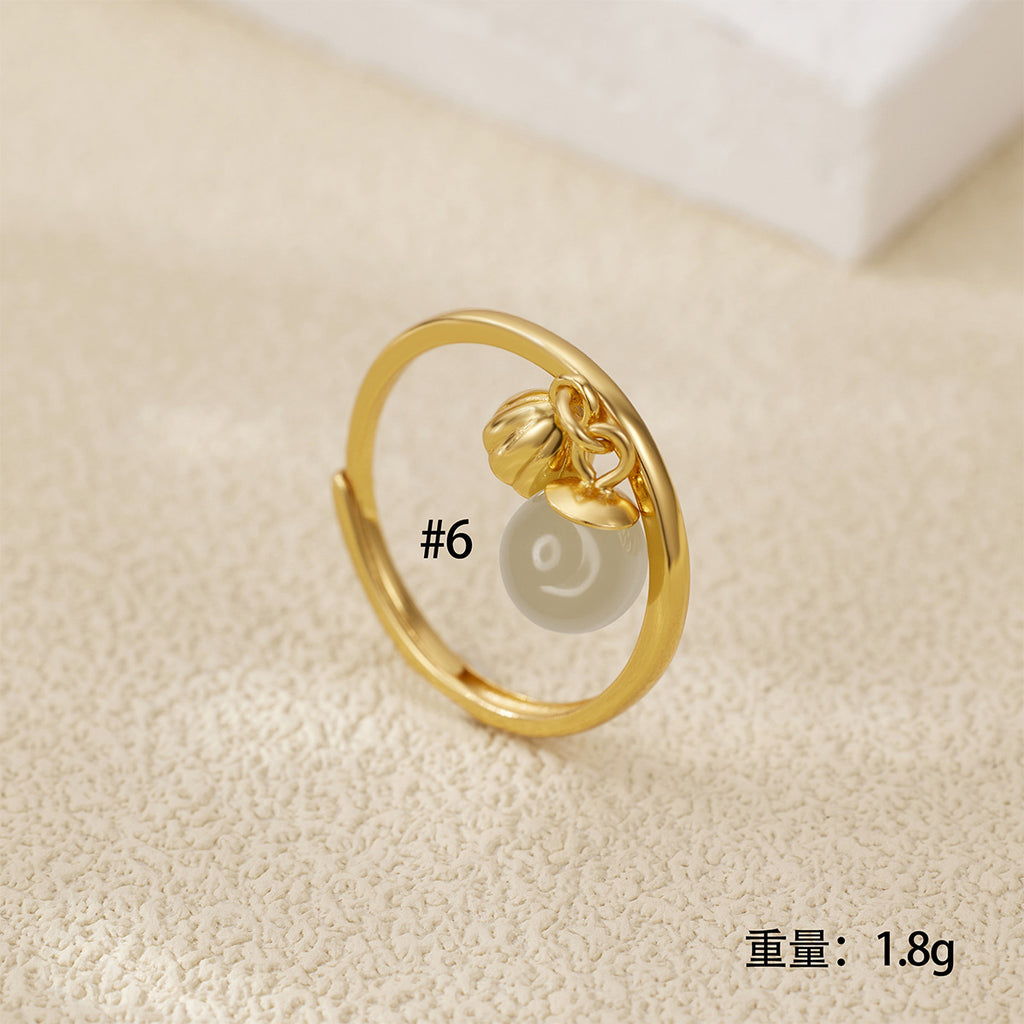 Damen eleganter Ring mit Perl- und Muschelanhänger Shop Nory