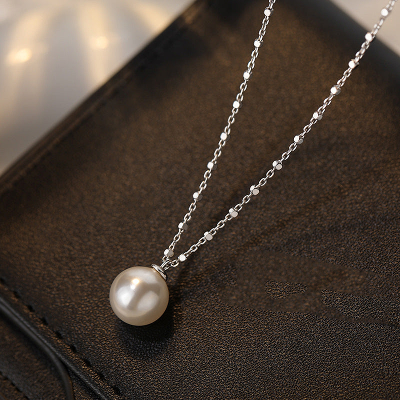 Damen elegante Halskette mit zeitlosem Perlenanhänger und feinem Kettendesign Shop Nory