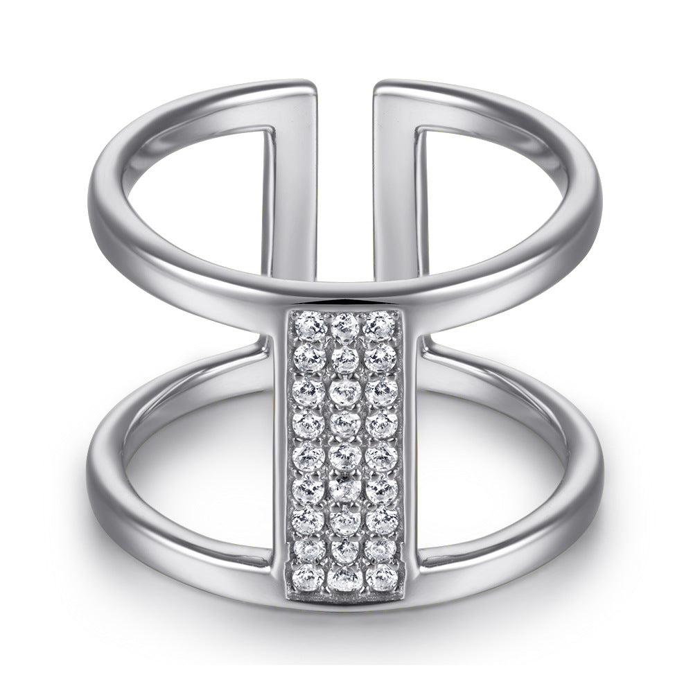 Damen Verlobungsring mit hochglänzendem, rechteckigem Edelstein und kunstvollen Zirkonia-Details Shop Nory
