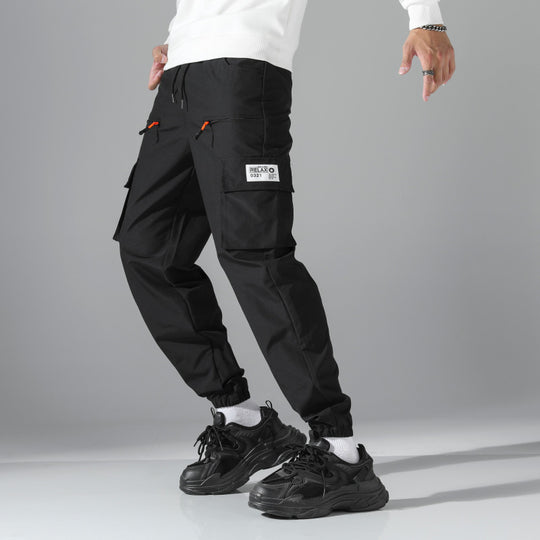 Herren konisch geschnittene Utility-Cargohose im Joggerstil mit Tunnelzugbund, Reißverschlusstaschen & elastischen Beinabschlüssen Shop Nory