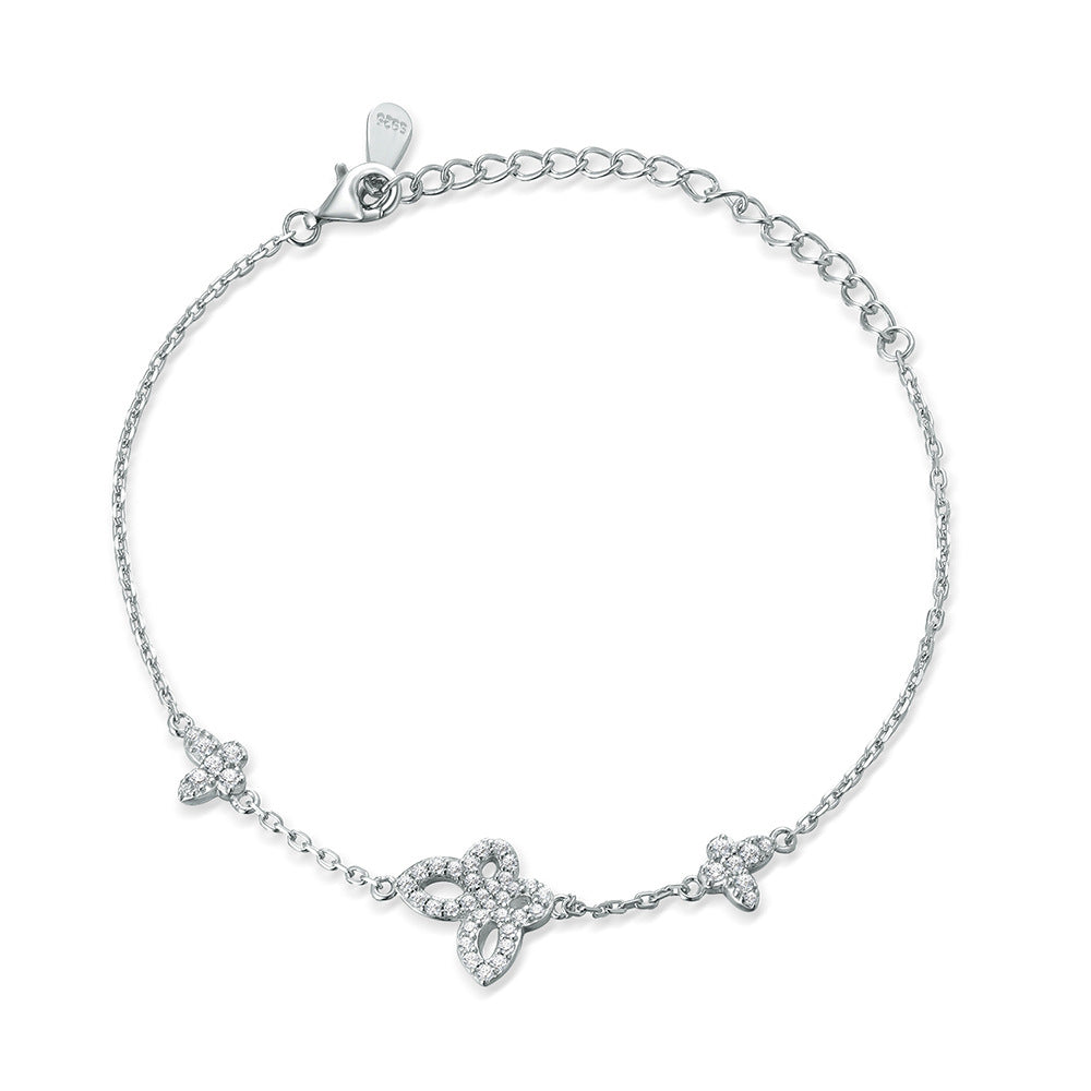 Damenarmband mit funkelndem Zirkonia und modernem Wellenmuster Shop Nory