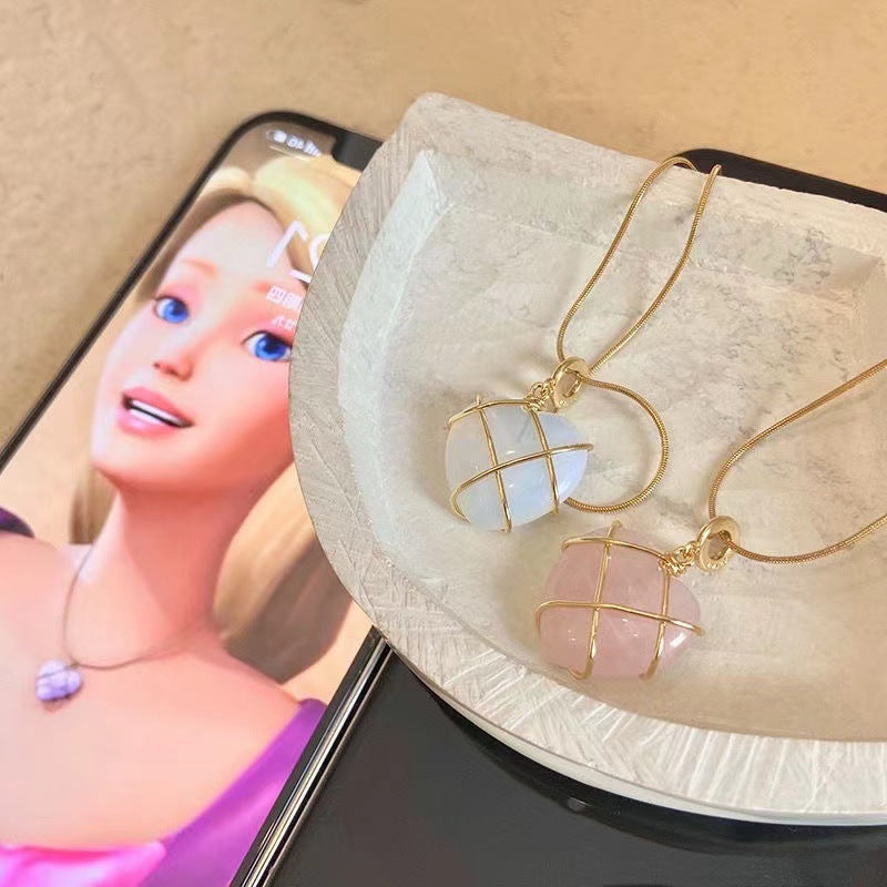 Damen Halskette mit einem eleganten, herzförmigen Anhänger aus hochwertigem Mineral Shop Nory