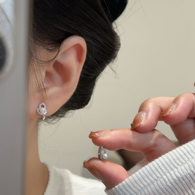 Damen Ohrstecker mit funkelndem Zirkon und elegantem Perlenmotiv Shop Nory