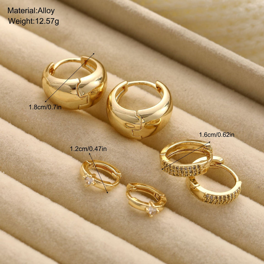 Damen Ohrringe Set mit funkelnden Zirkonia und geschwungenem Design Shop Nory
