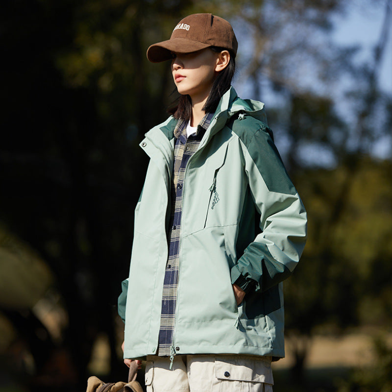 Damen zweilagige wasserabweisende Outdoorjacke mit Kapuze, Taillenregulierung und Kontrastbesätzen Shop Nory