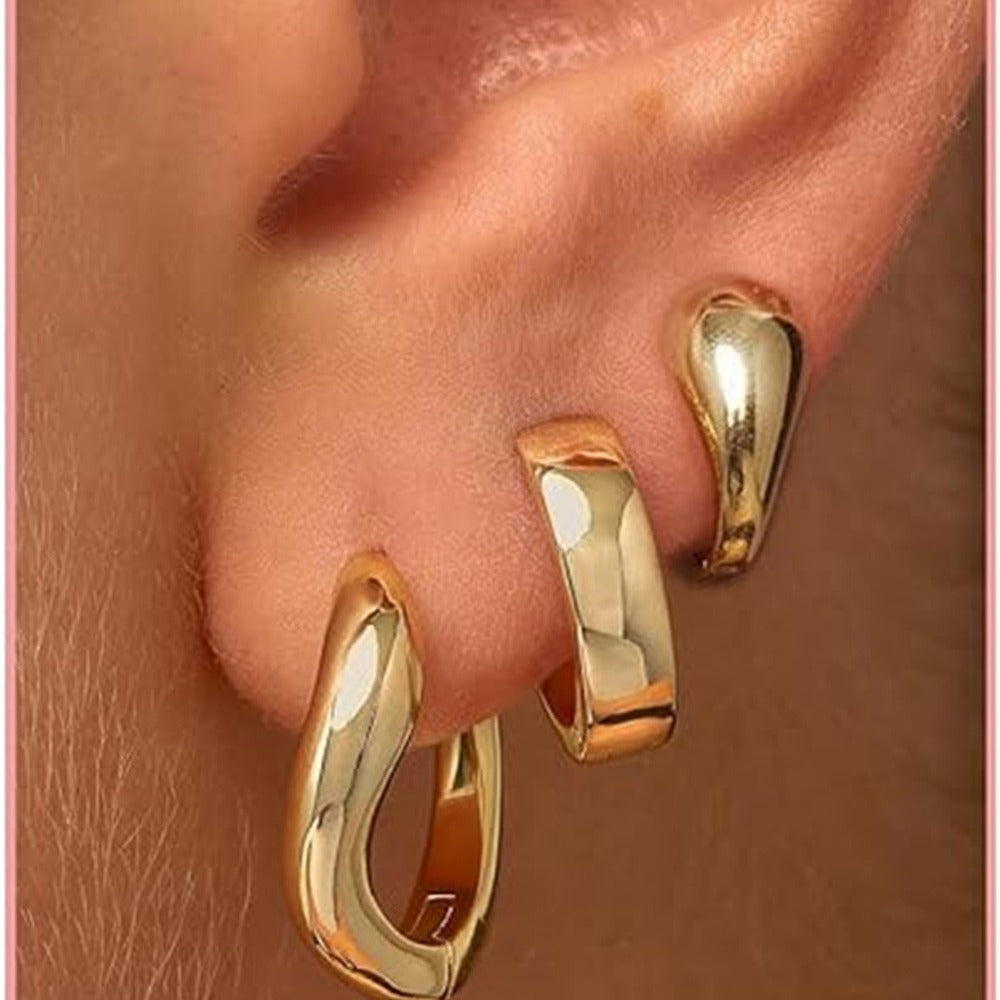 Damen Ohrhänger mit geschwungenem Design und glänzender Oberfläche Shop Nory