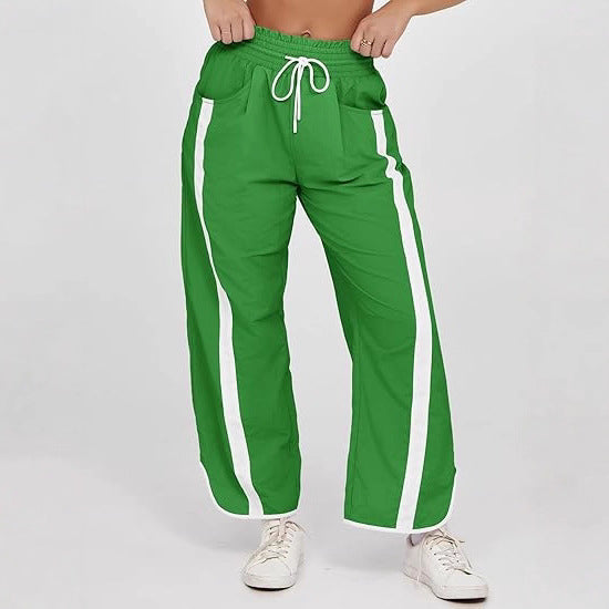 Damen nan relaxte Trackpants mit seitlichem Kontraststreifen, elastischem Smokbund und Eingrifftaschen Shop Nory