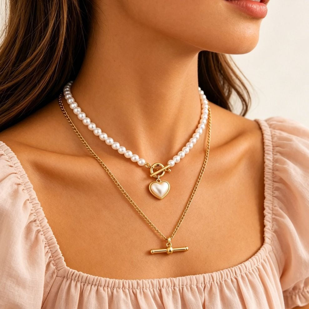 Damen Halskette mit Perlenanhänger und charmantem Herzdesign Shop Nory