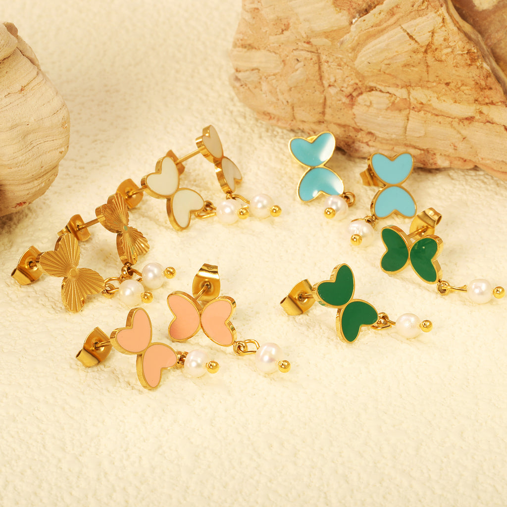 Damen Ohrringe mit modernen Herz-Akzenten und Perlenschmuck Shop Nory