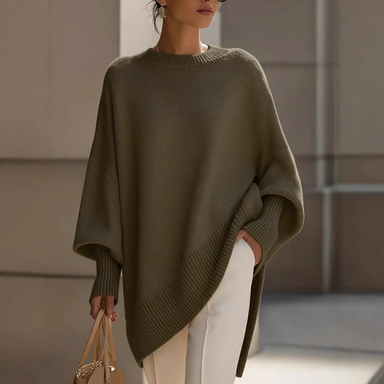 Damen nan Oversize Strickponcho mit asymmetrischem Saum und gerippten Ärmeln Shop Nory