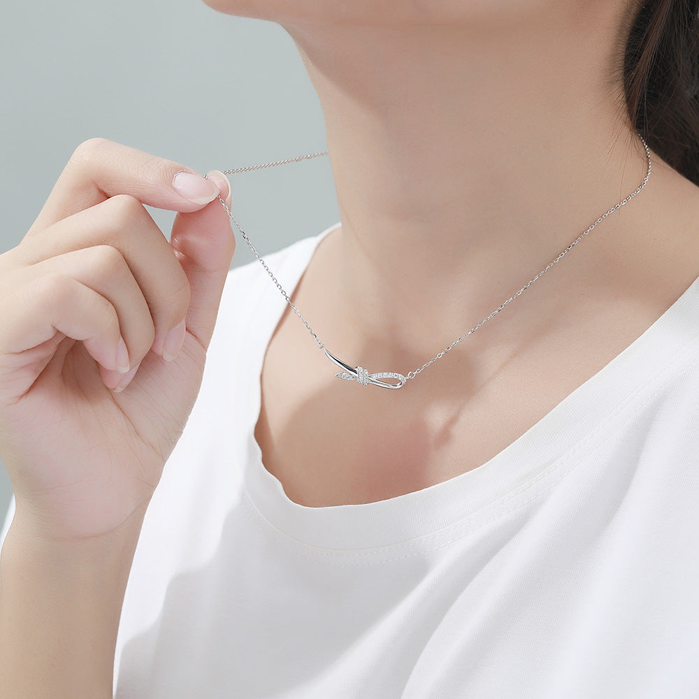 Damen Halskette mit elegantem Schleifenmotiv und funkelnden Zirkonia-Steinen Shop Nory