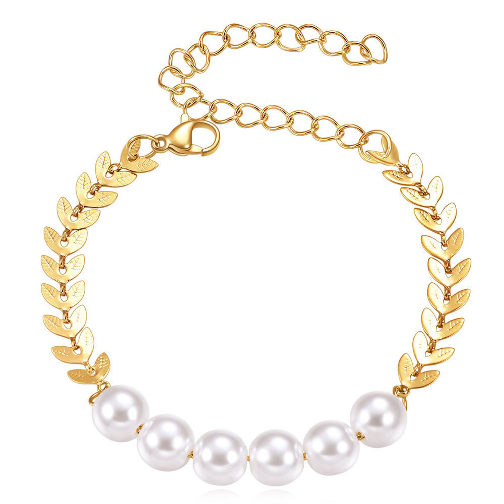 Damen Armreif mit elegantem Blattdesign und funkelnden Perlendetails Shop Nory