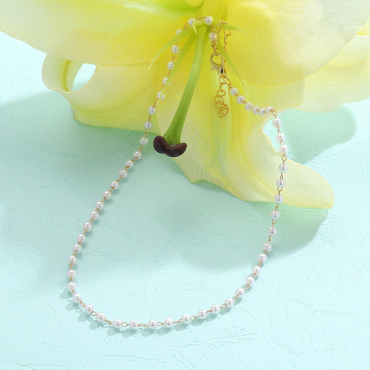 Damen Choker-Halskette mit feinen Perlen und eleganten Akzenten Shop Nory